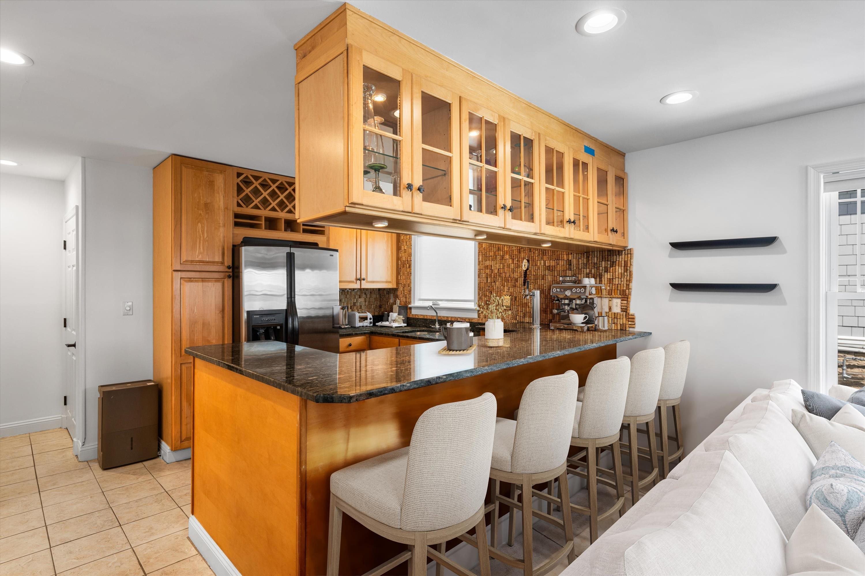246 103rd Street Stone Harbor, NJ 08247 - Photo 20 of 50 a dining room with furniture and wooden floor