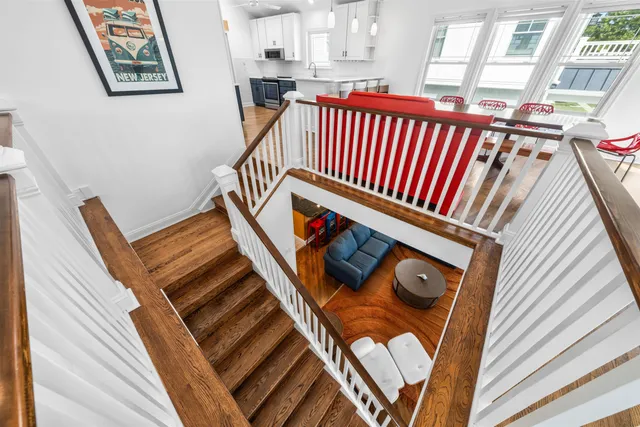 a view of stairs and living area