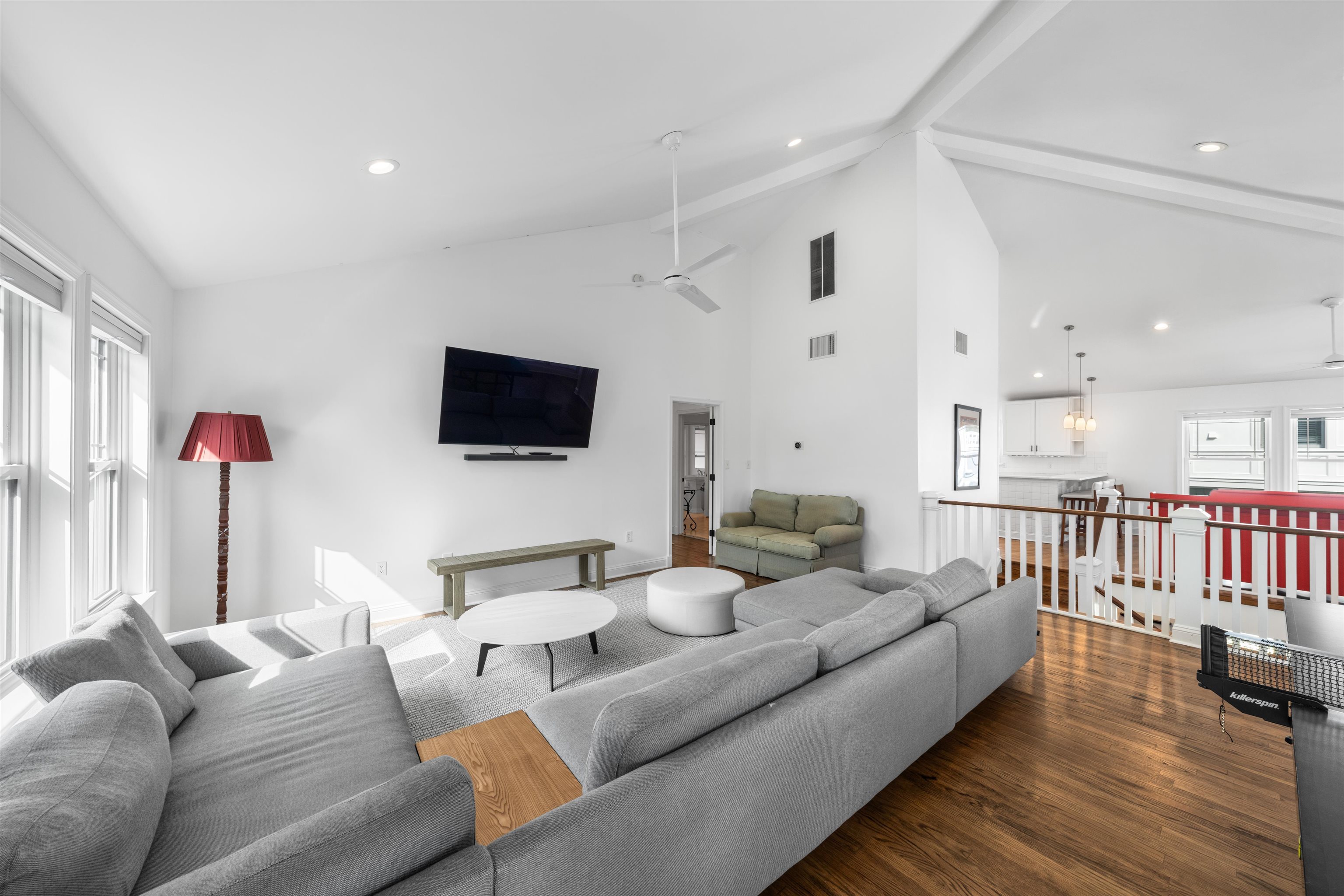 246 103rd Street Stone Harbor, NJ 08247 - Photo 37 of 50 a living room with furniture and a flat screen tv
