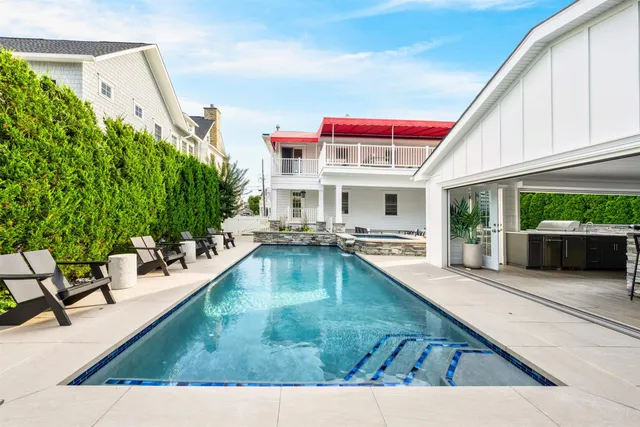 a view of a house with swimming pool