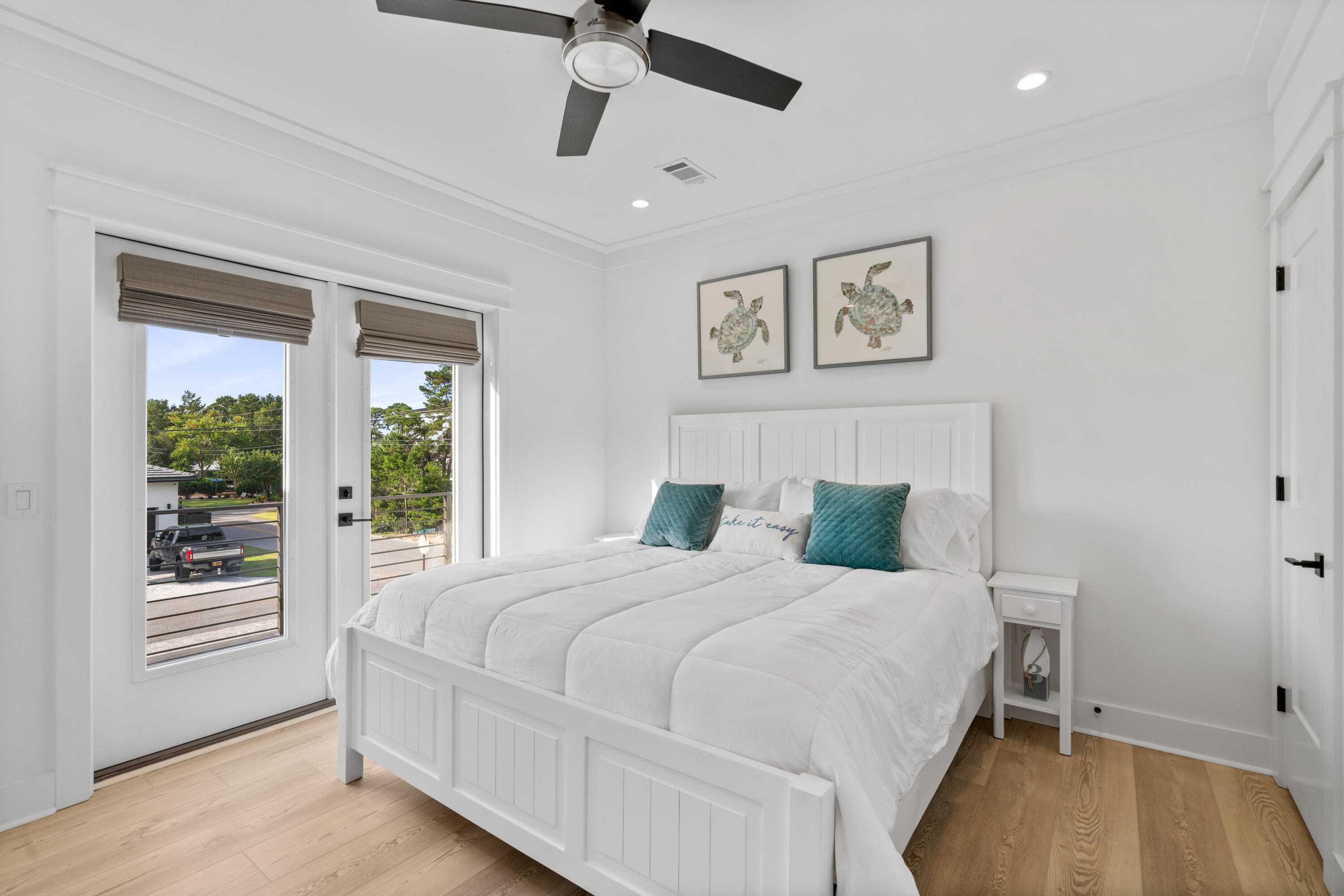 11 Walnut Street Santa Rosa Beach, FL 32459 - Photo 54 of 105 a bedroom with a bed and a large window