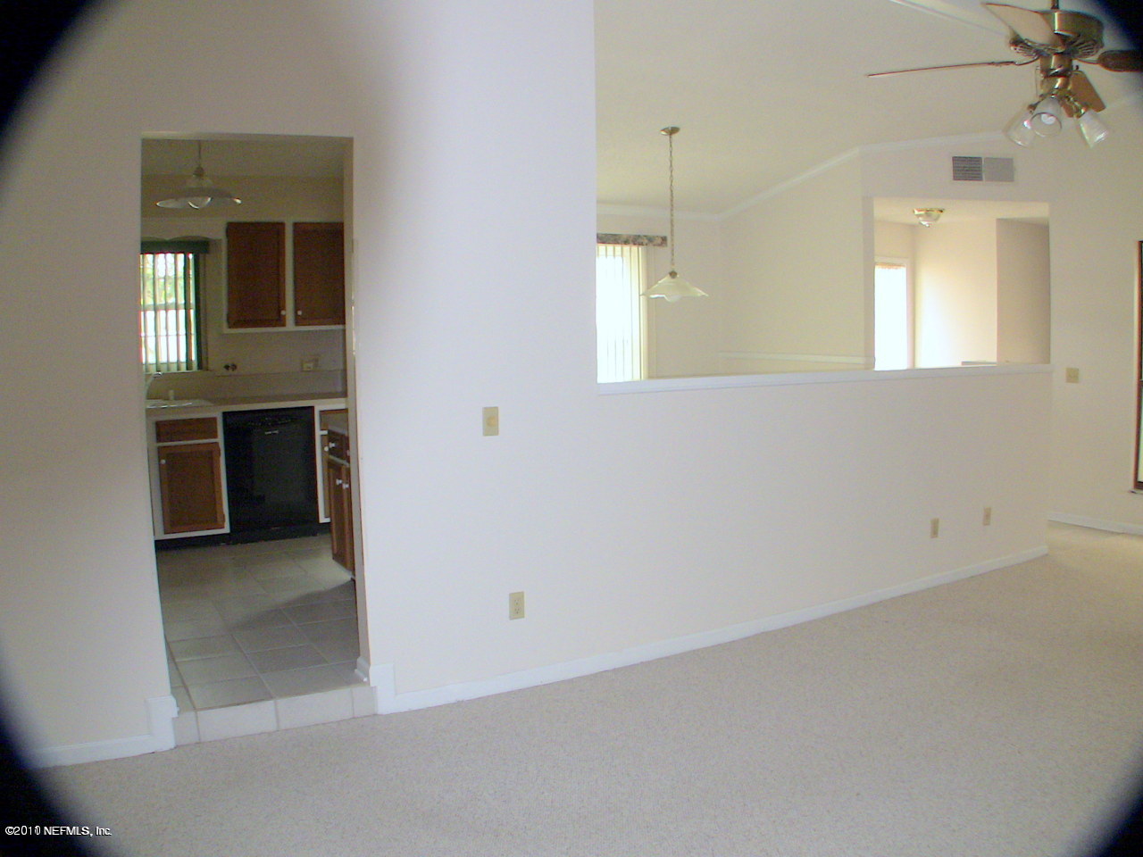 10844 Reading Road Jacksonville, FL 32257 - Photo 7 of 10 an empty room with a bathroom and a window