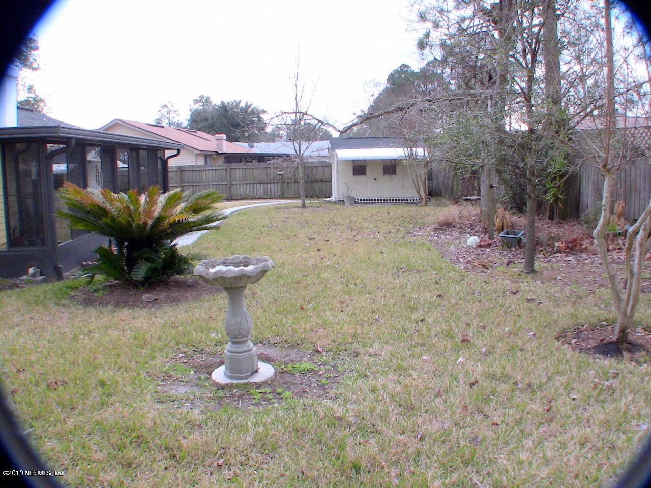 10844 Reading Road Jacksonville, FL 32257 - Photo 10 of 10 a view of a house with backyard porch and sitting area