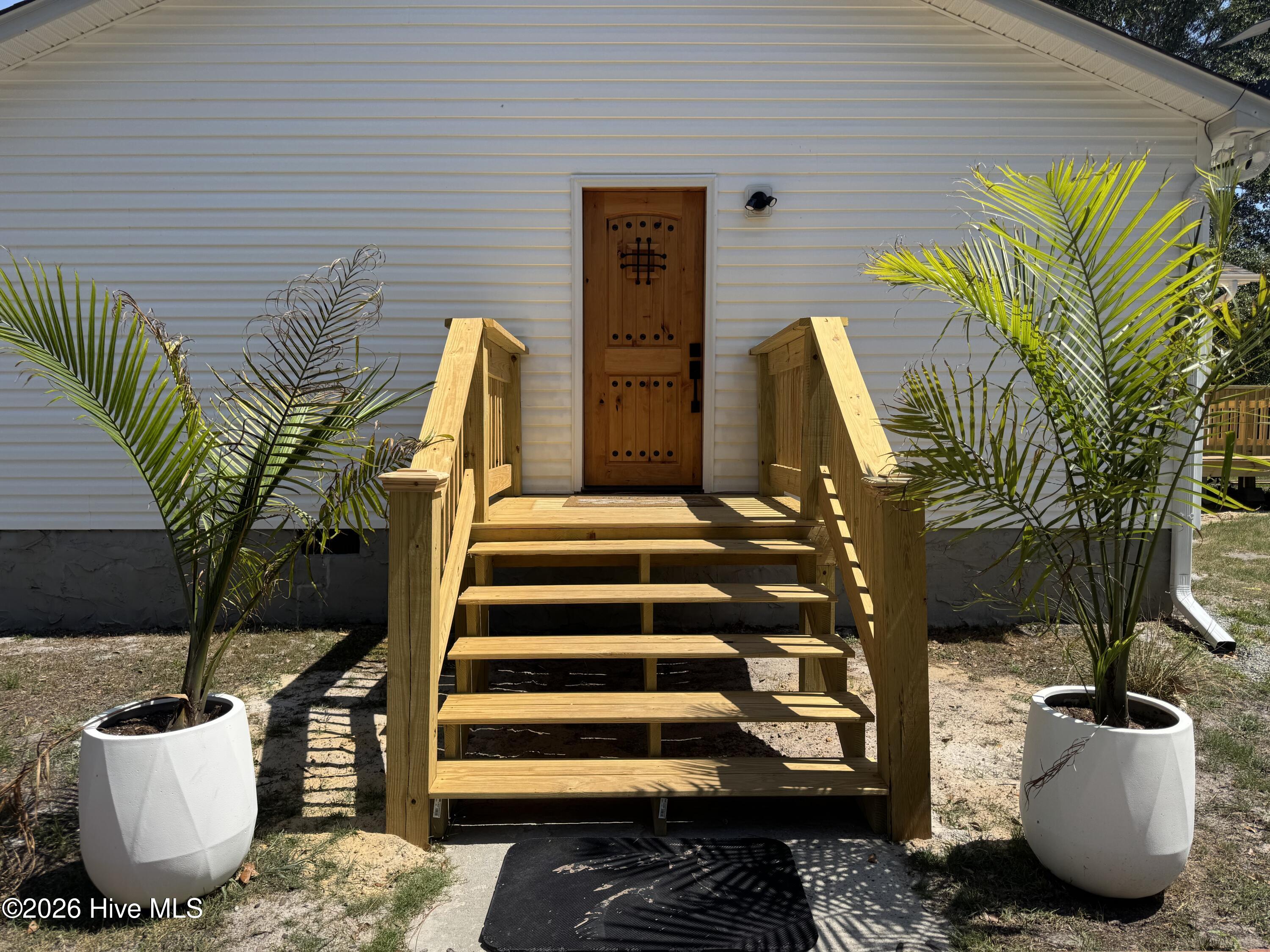 1265 Gilbert Road Southeast Bolivia, NC 28422 - Photo 11 of 46 Side door entrance