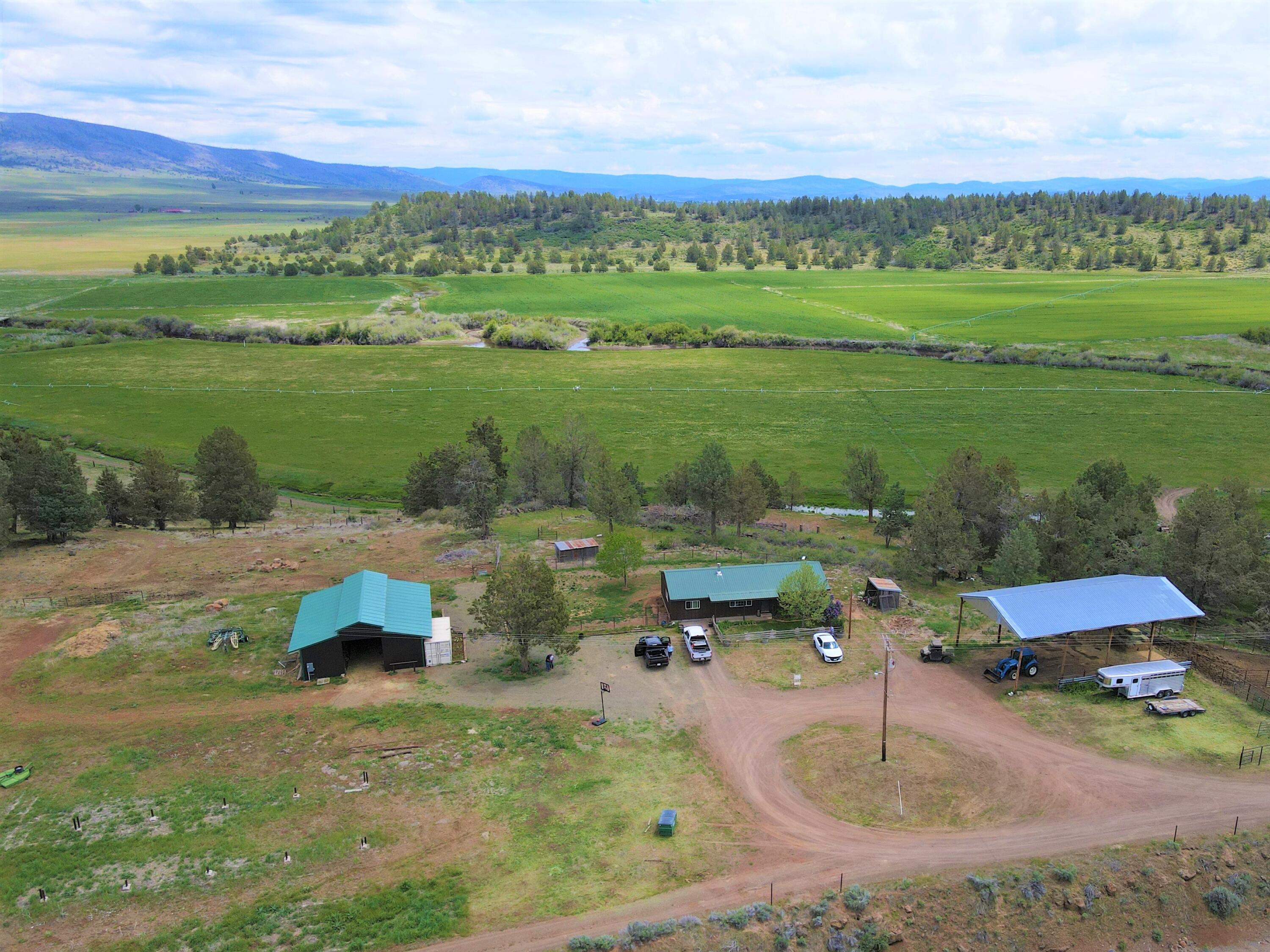 3798 County Road 91 Lookout, CA 96054 - Photo 12 of 54 a backyard of a house with table and chairs