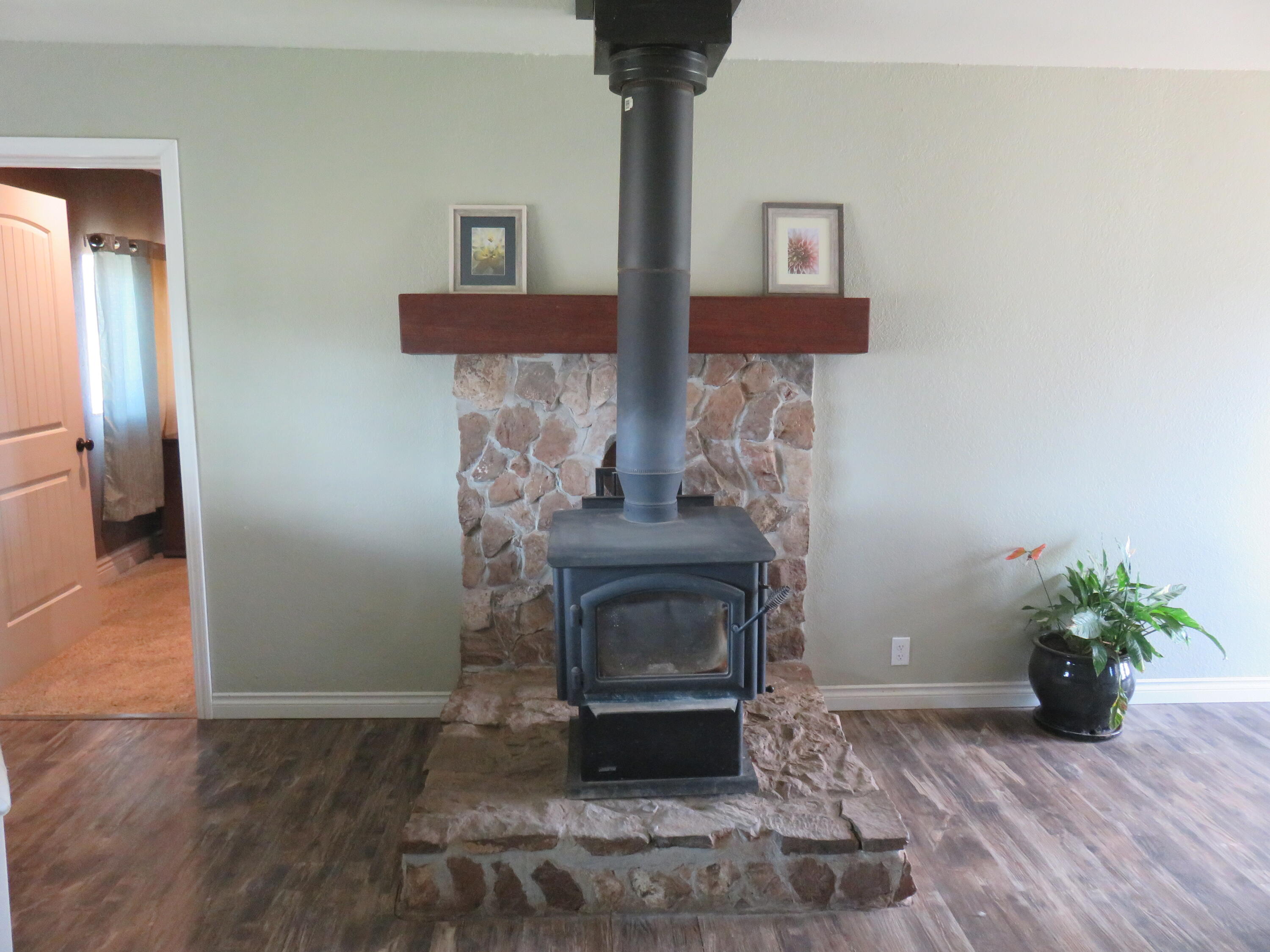 3798 County Road 91 Lookout, CA 96054 - Photo 16 of 54 a living room with furniture and a fireplace