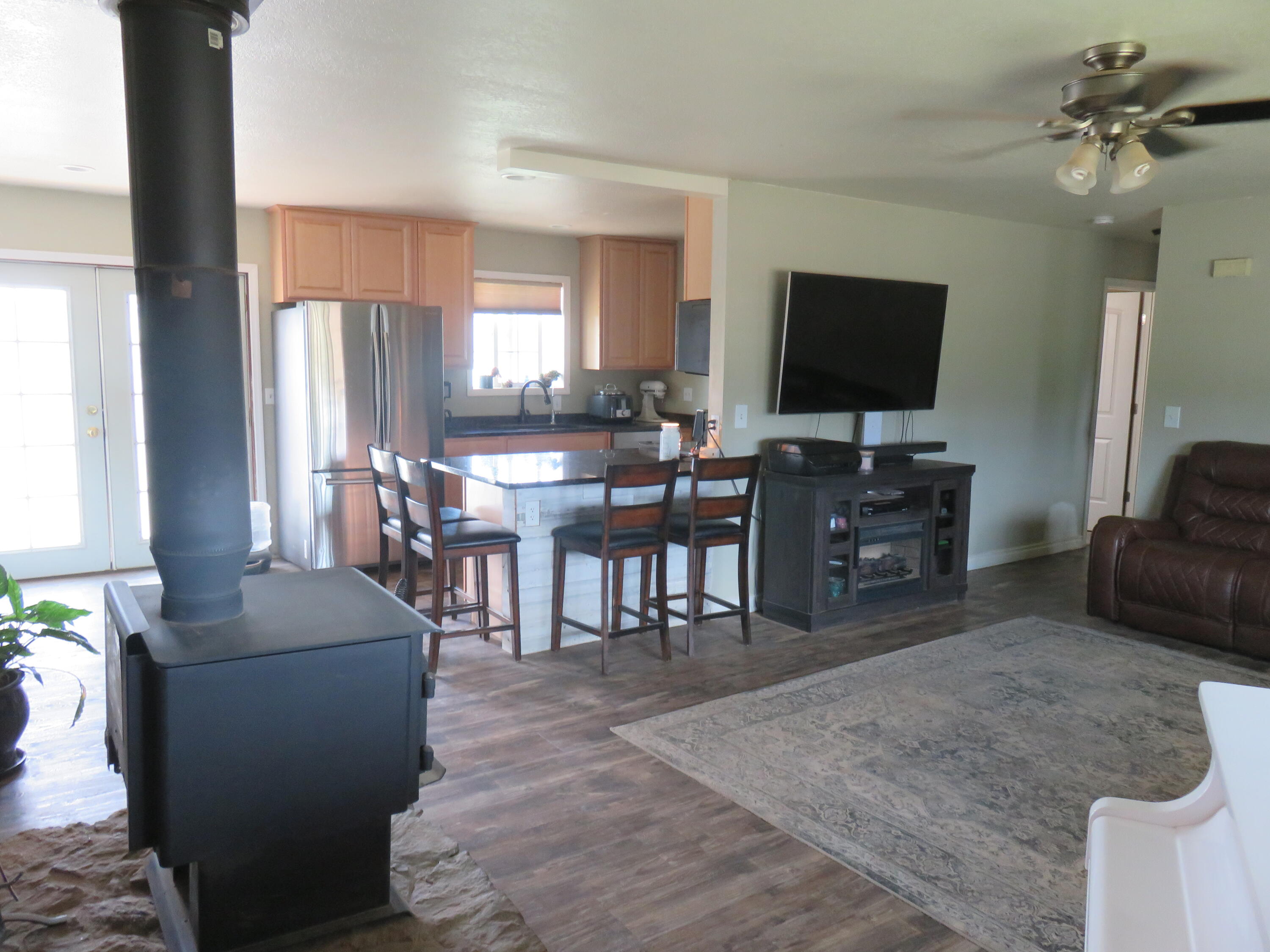 3798 County Road 91 Lookout, CA 96054 - Photo 17 of 54 a living room with furniture and a flat screen tv