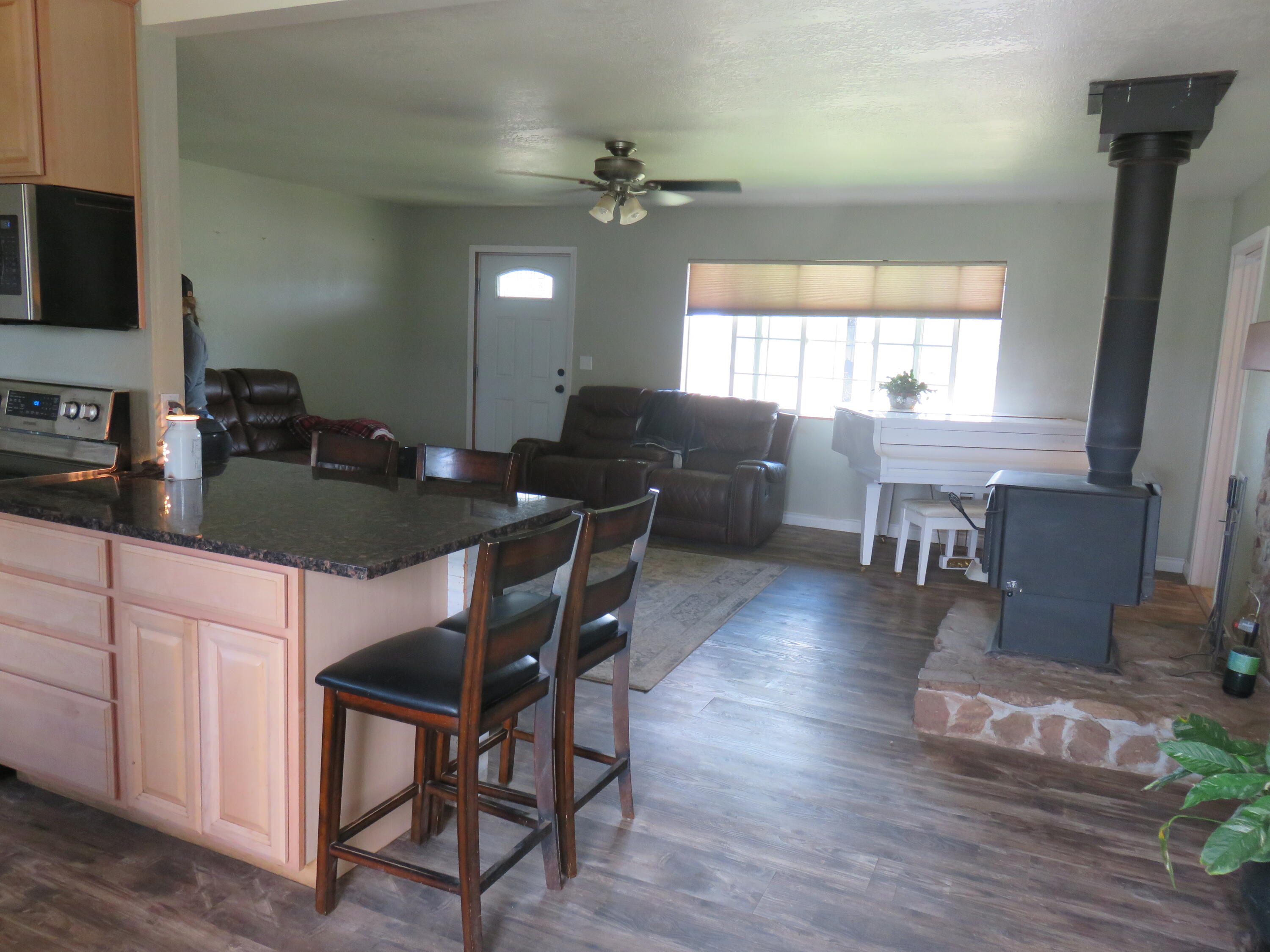 3798 County Road 91 Lookout, CA 96054 - Photo 21 of 54 a view of a dining room with furniture and a chandelier
