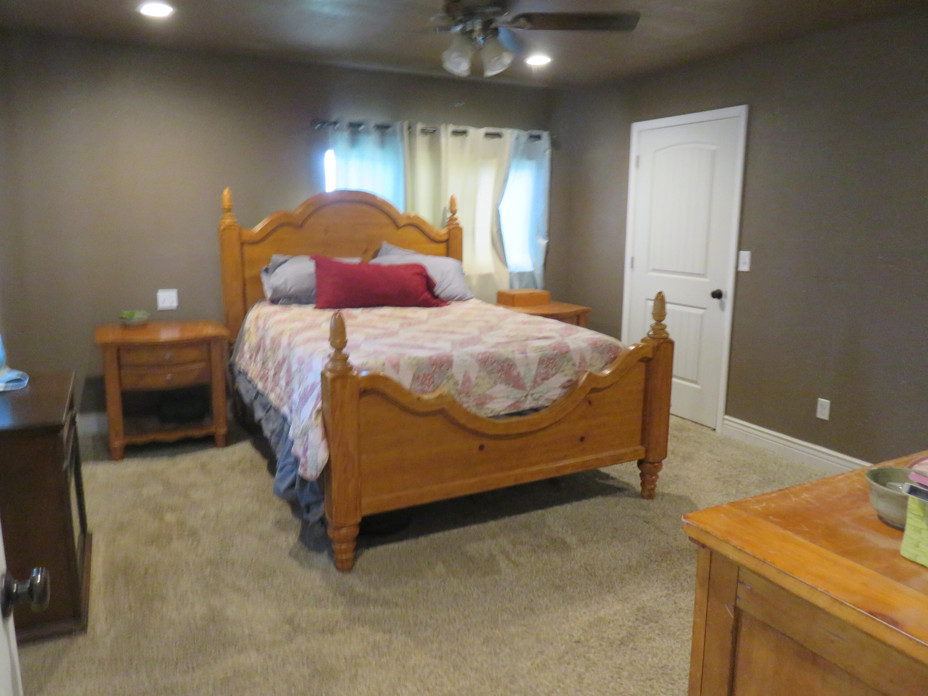 3798 County Road 91 Lookout, CA 96054 - Photo 25 of 54 a bedroom with a bed and a table