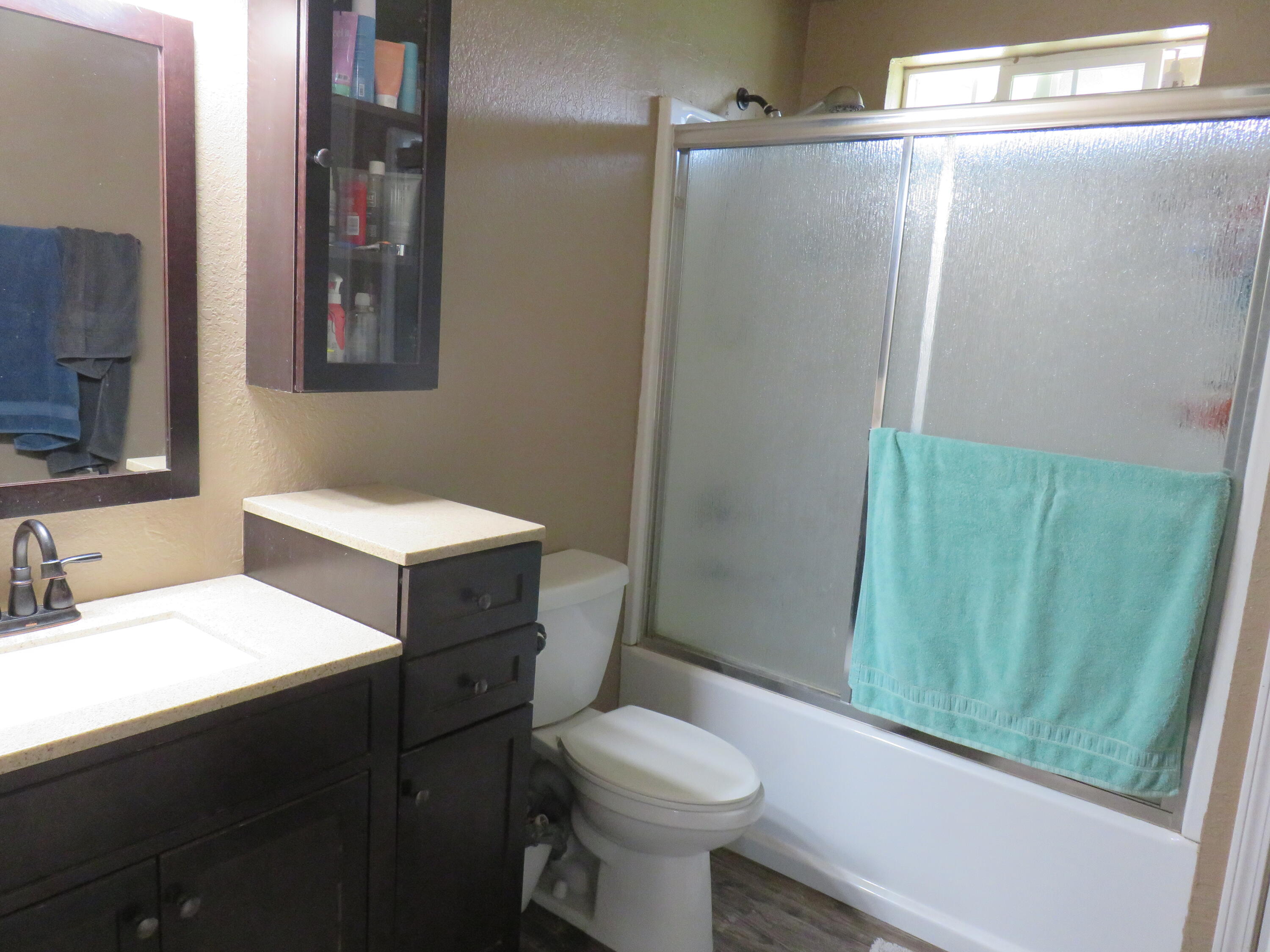 3798 County Road 91 Lookout, CA 96054 - Photo 26 of 54 a bathroom with a sink toilet and shower