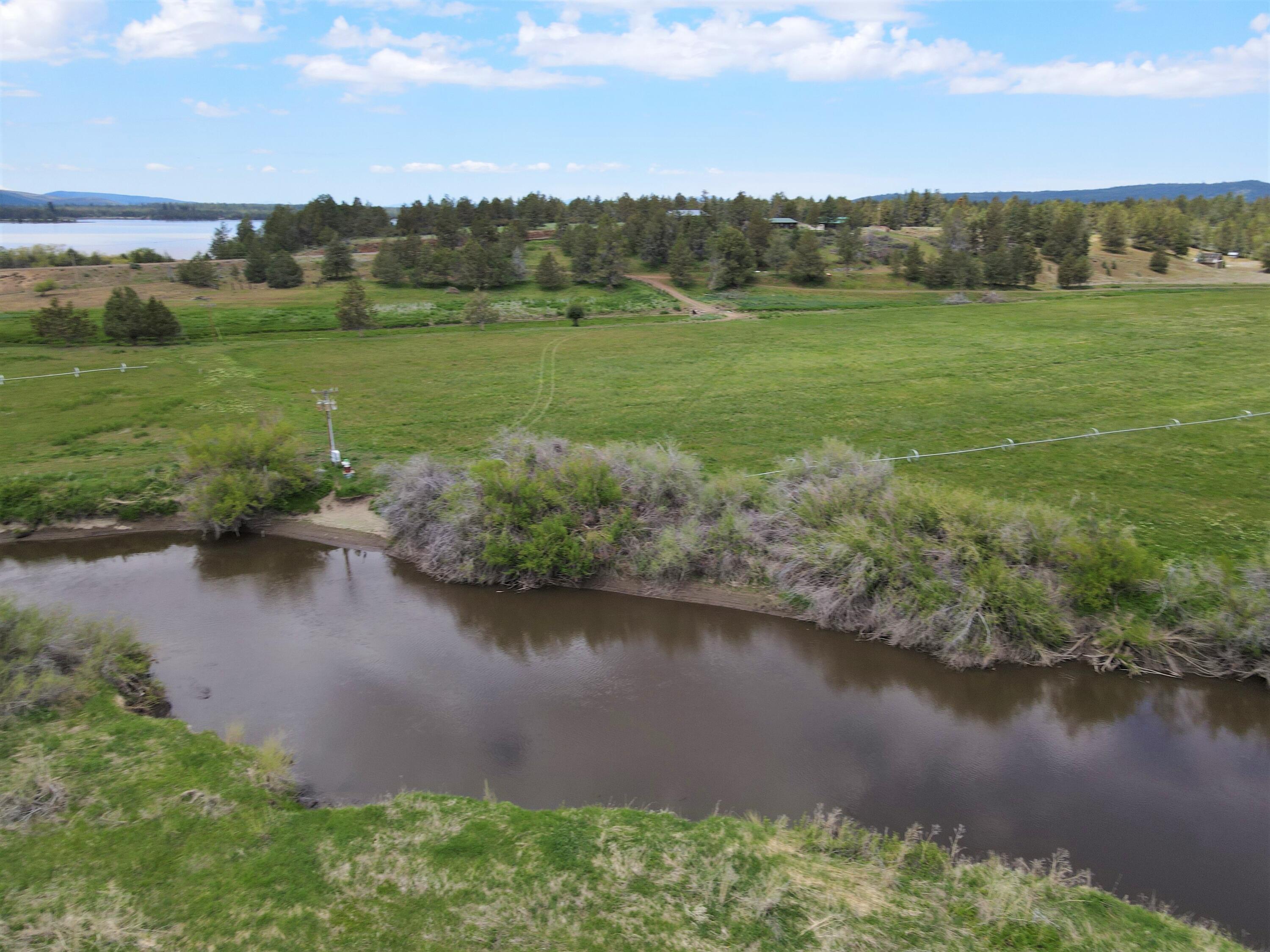 3798 County Road 91 Lookout, CA 96054 - Photo 53 of 54 a view of a lake with houses in the back