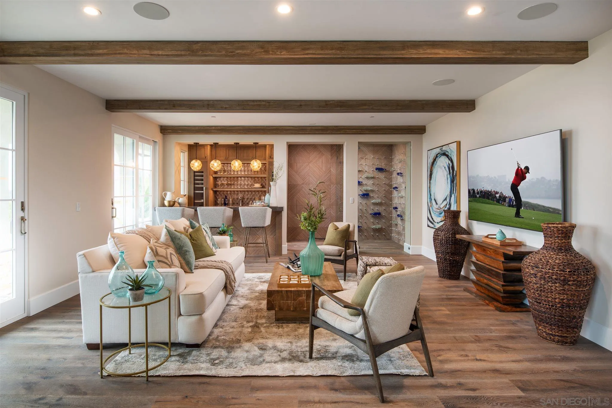 1206 Muirlands Drive La Jolla, CA 92037 - Photo 23 of 75 a living room with furniture and a potted plant