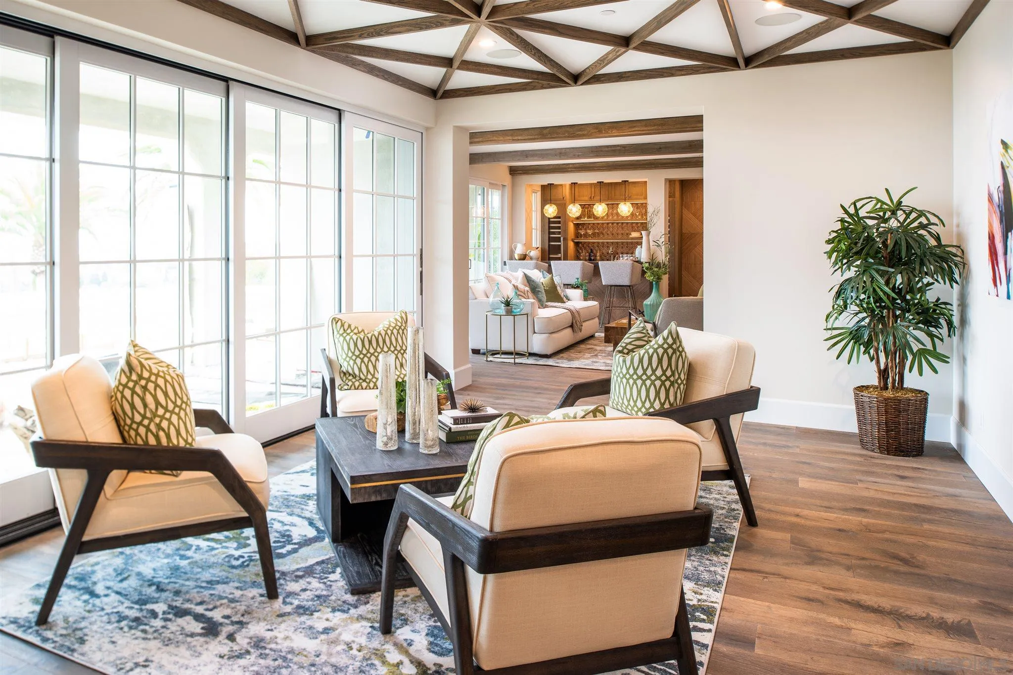 1206 Muirlands Drive La Jolla, CA 92037 - Photo 26 of 75 a living room with furniture and a potted plant