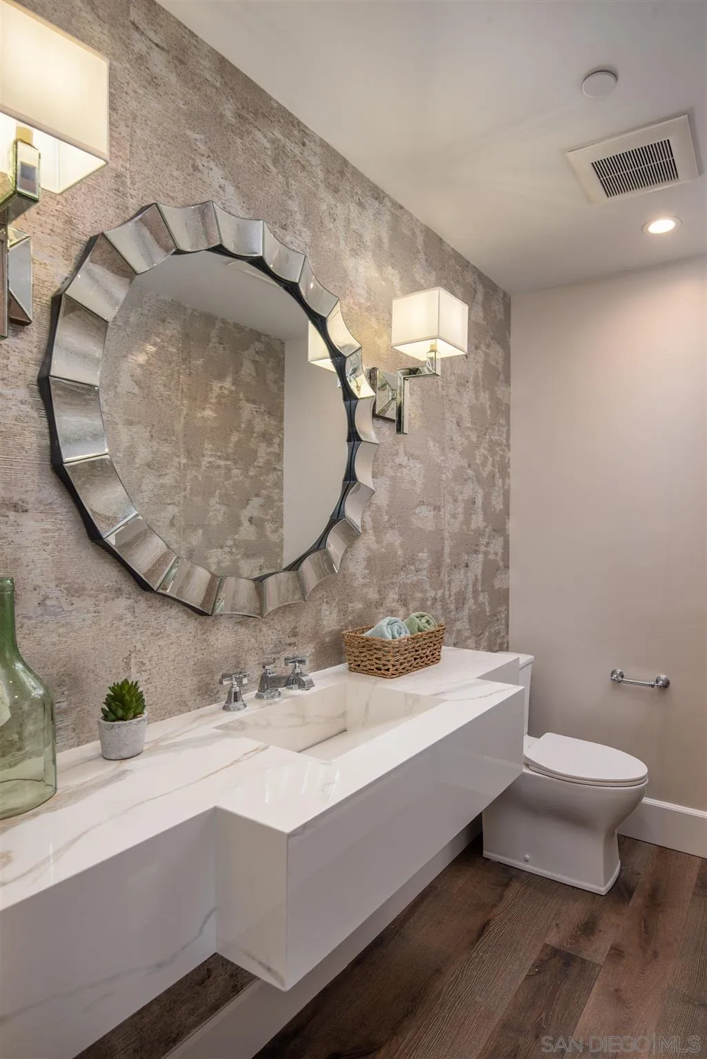 1206 Muirlands Drive La Jolla, CA 92037 - Photo 47 of 75 a bathroom with a sink and mirror