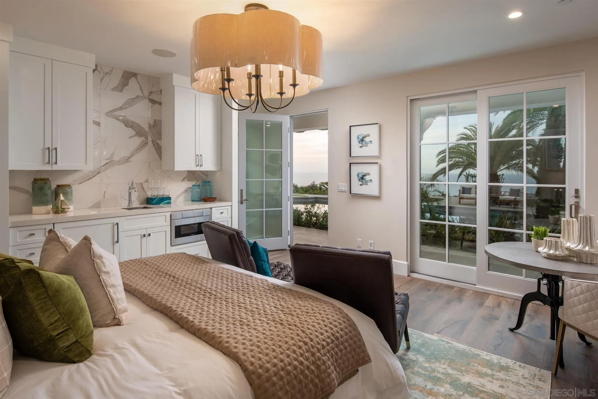 1206 Muirlands Drive La Jolla, CA 92037 - Photo 62 of 75 a bedroom with furniture and a large window