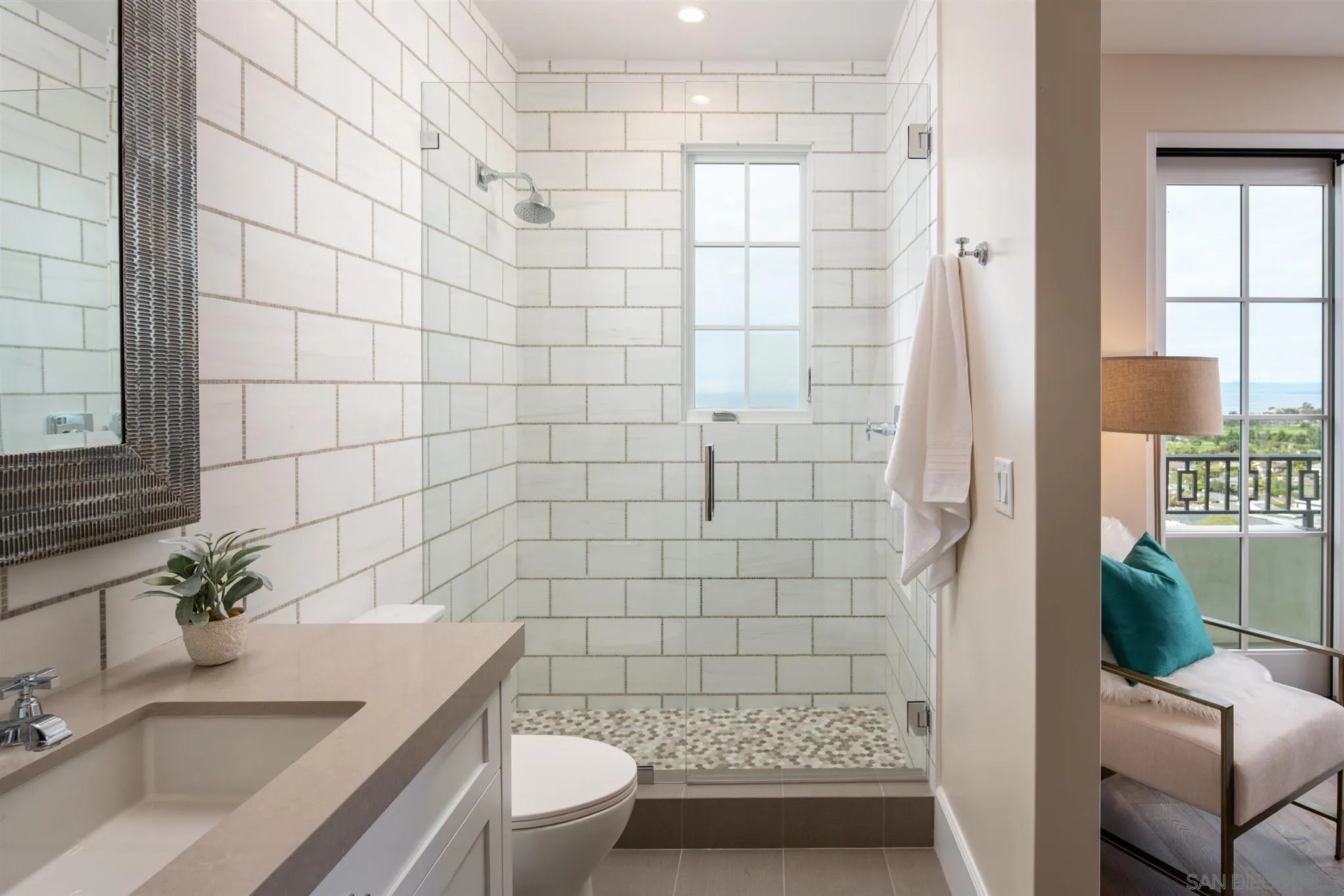 1206 Muirlands Drive La Jolla, CA 92037 - Photo 66 of 75 a bathroom with a sink a toilet and shower