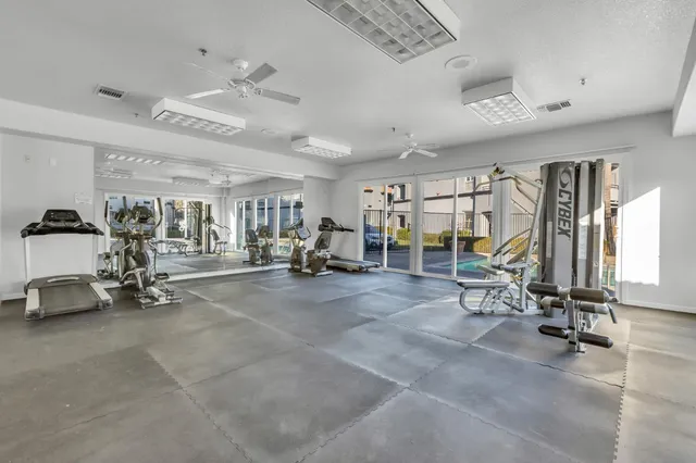 a view of a room with gym equipment