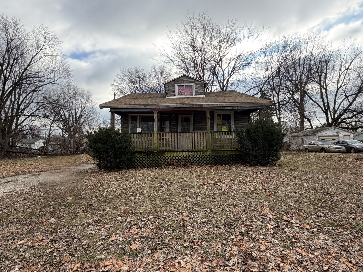 1159 East Mueller Avenue Decatur, IL 62526 - Photo 1 of 1 a front view of a house with a garden