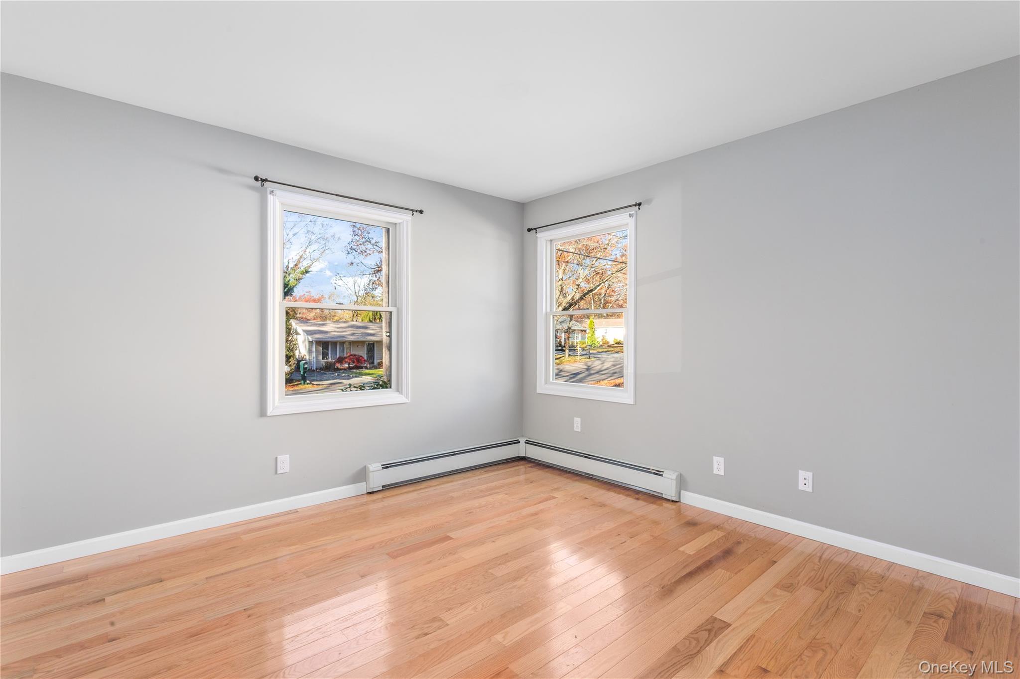 11 Seneca Trail Ridge, NY 11961 - Photo 7 of 10 an empty room with a window