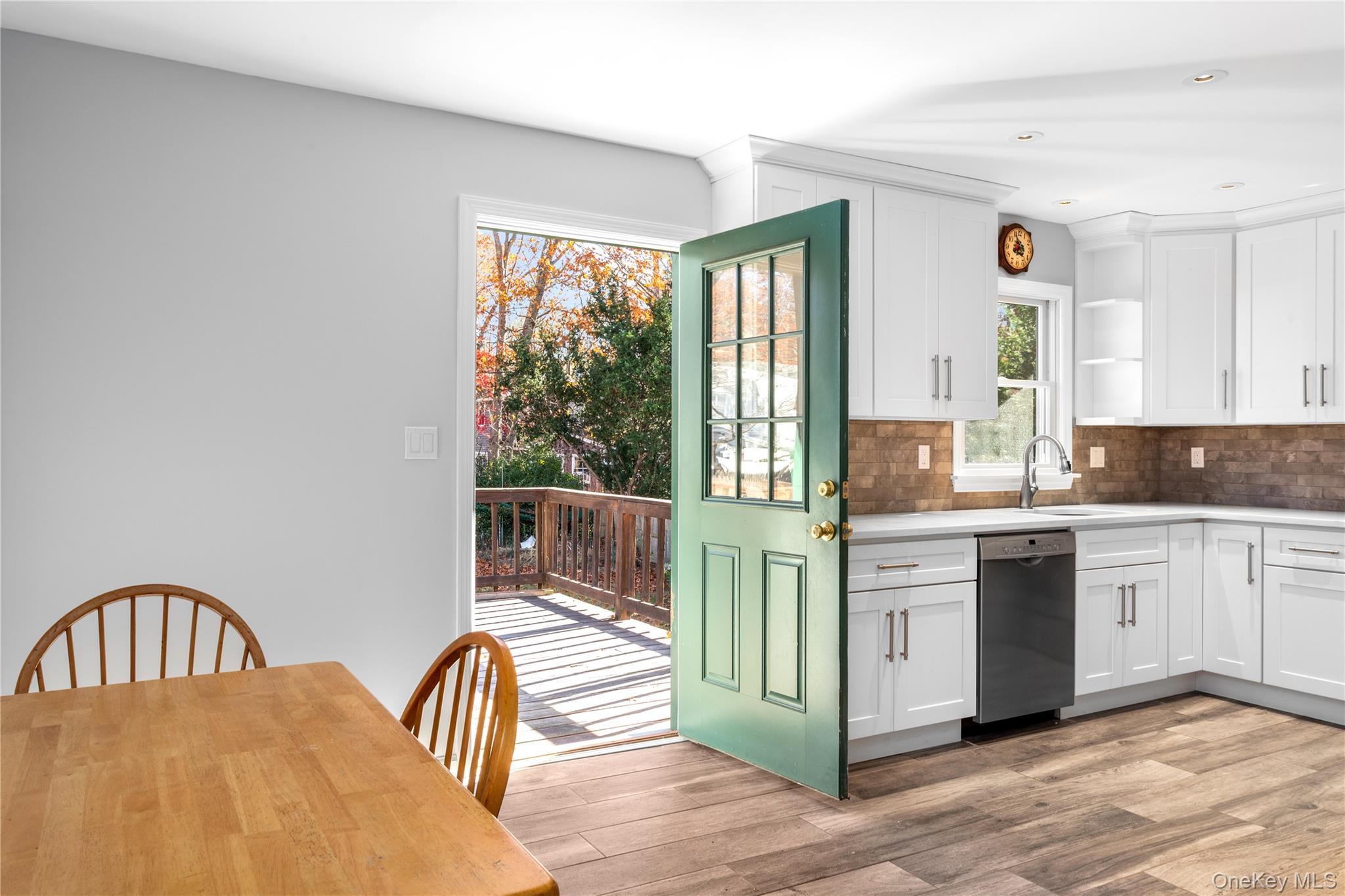11 Seneca Trail Ridge, NY 11961 - Photo 8 of 10 a spacious bedroom with a bed and a large window