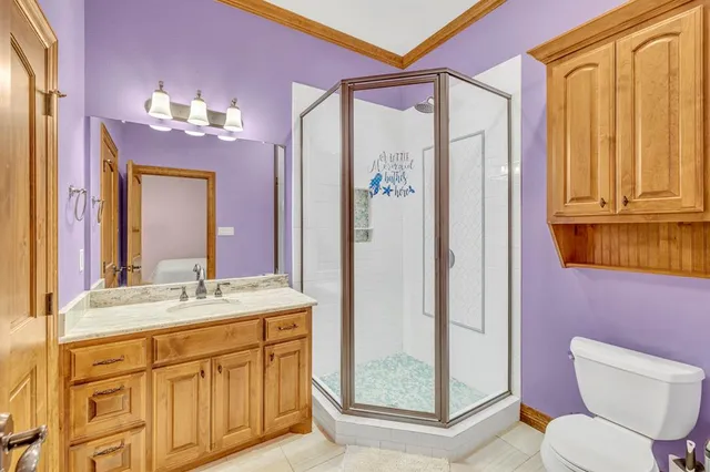 a bathroom with a sink a vanity and a mirror