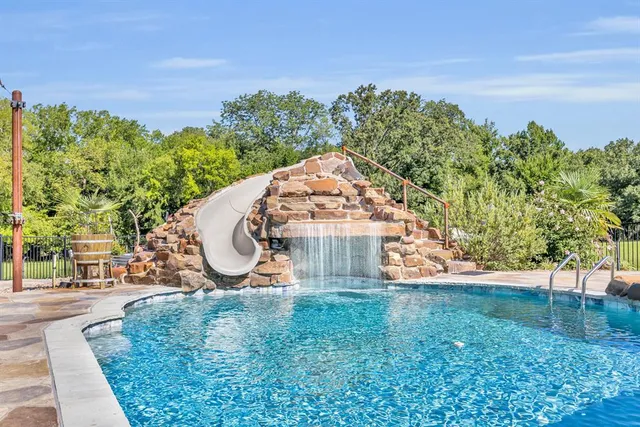 a view of a garden with a slide