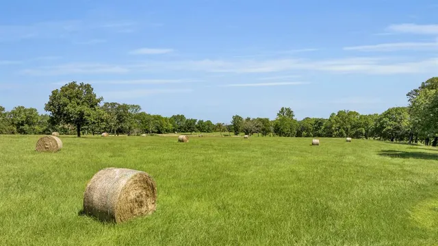 a view of a golf course with a lake