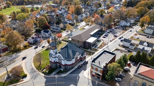 an aerial view of a swimming pool and outdoor space