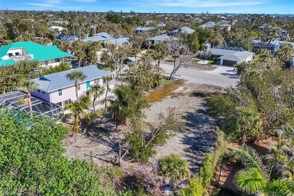 an aerial view of a city with lots of residential buildings