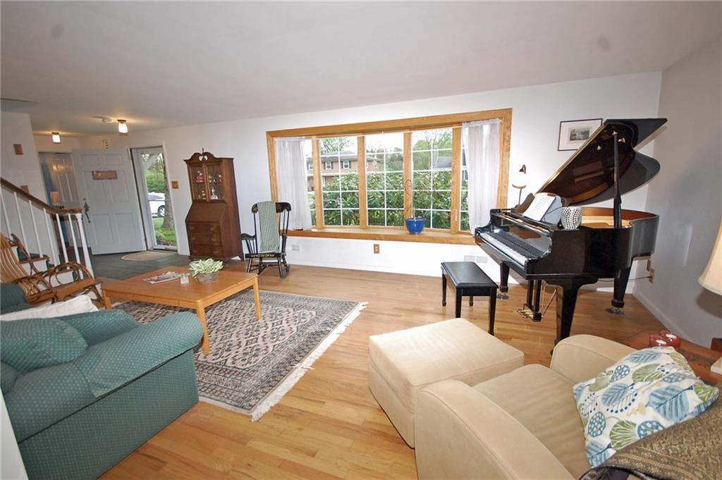 575 Miranda Road Pittsburgh, PA 15241 - Photo 2 of 24 Large bay window in living room brings in lot of natural light.
