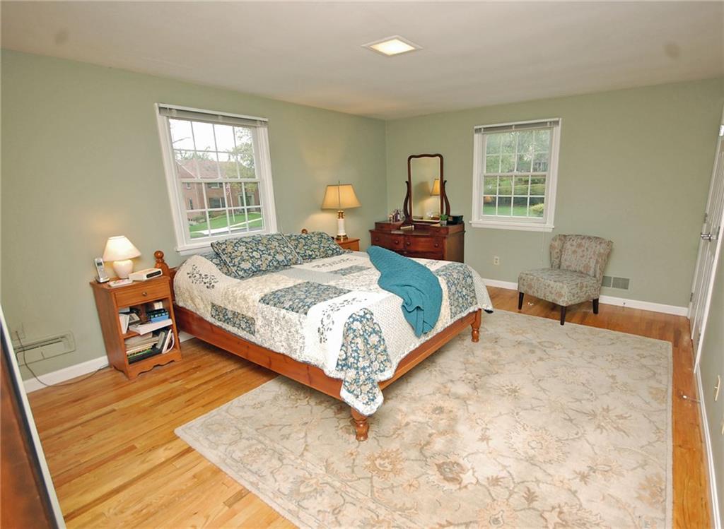 575 Miranda Road Pittsburgh, PA 15241 - Photo 11 of 24 Spacious bedroom with hardwood floors.