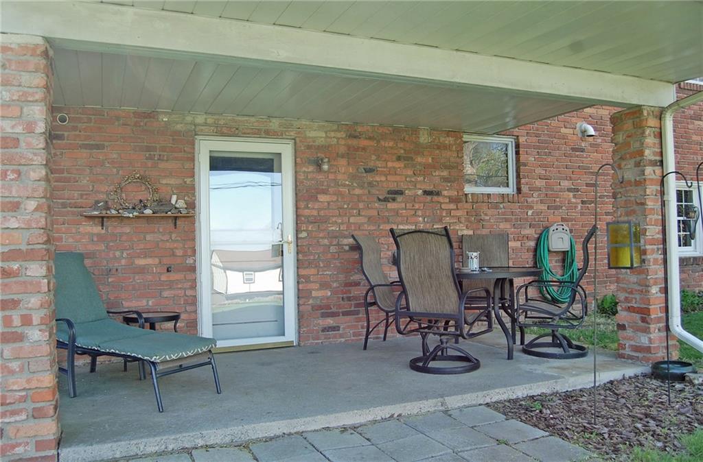 575 Miranda Road Pittsburgh, PA 15241 - Photo 17 of 24 Covered back porch off of the basement is private and perfect for summer meals and just relaxing.