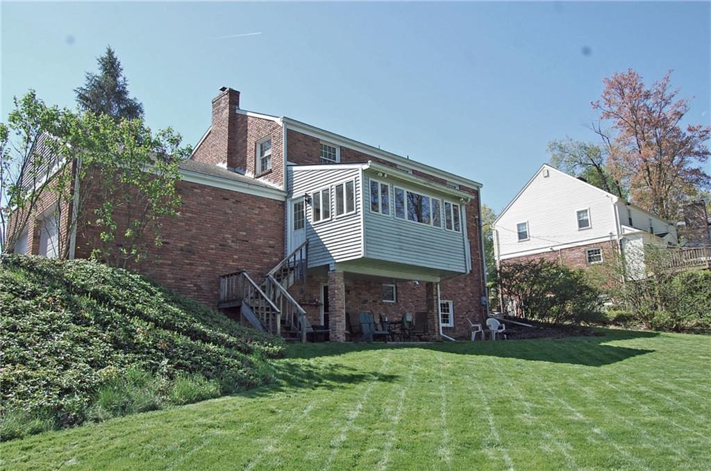 575 Miranda Road Pittsburgh, PA 15241 - Photo 21 of 24 Steps from the sun porch take you to the back yard and patio under the sun room.