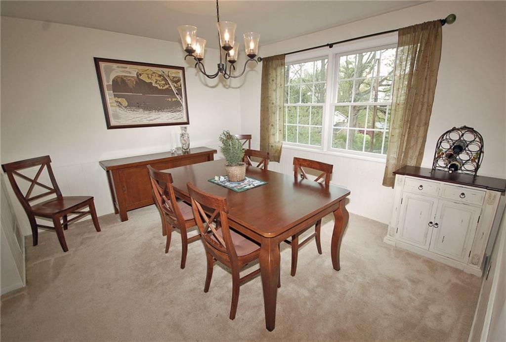 575 Miranda Road Pittsburgh, PA 15241 - Photo 4 of 24 Formal dining room with hardwood floors under the carpet.