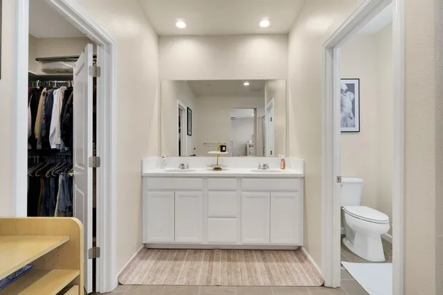 an aerial view of multiple houses with yard