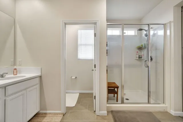 an aerial view of a house with a garden