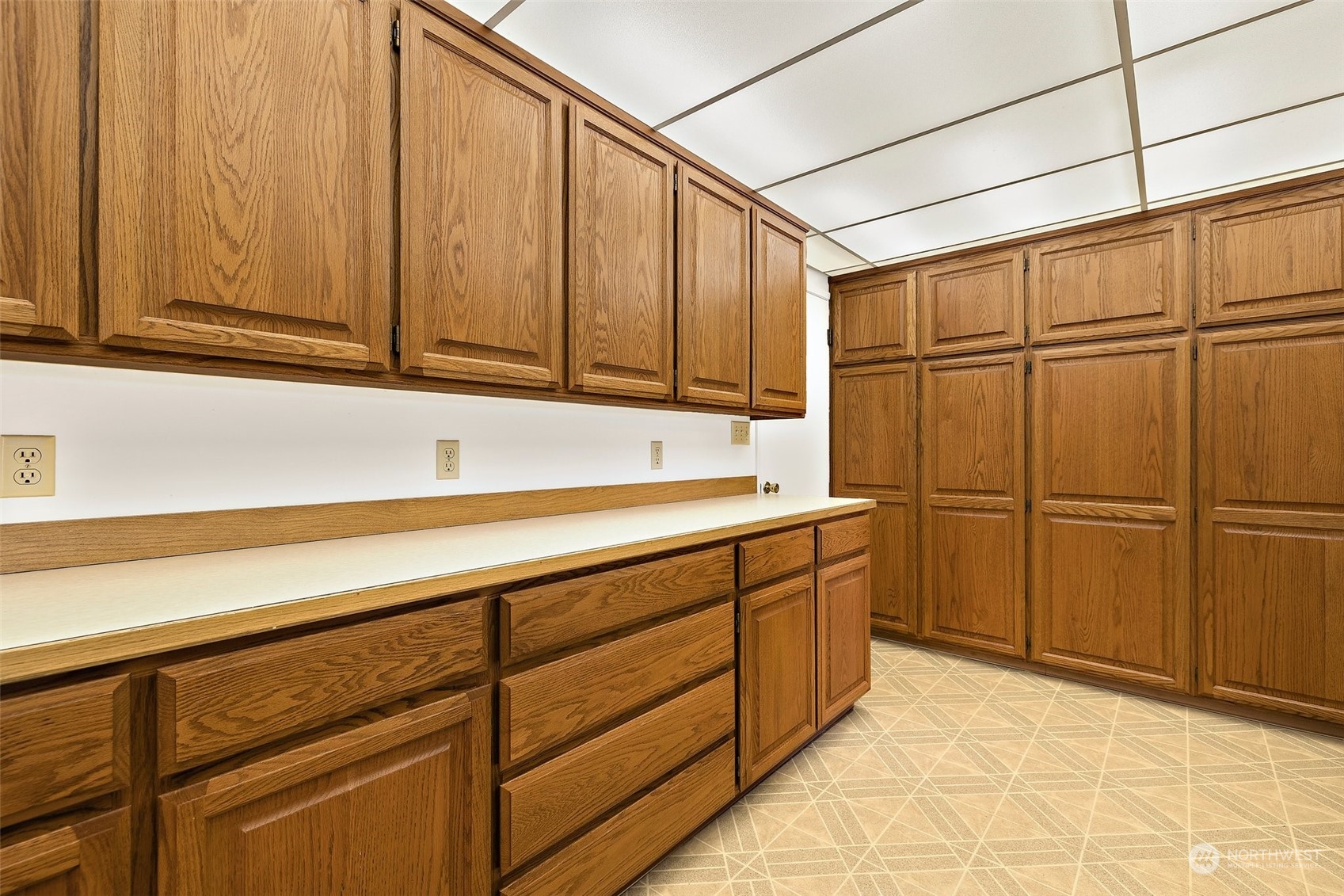 14530 Southeast 112th Place Renton, WA 98059 - Photo 11 of 34 a room with a sink and cabinets