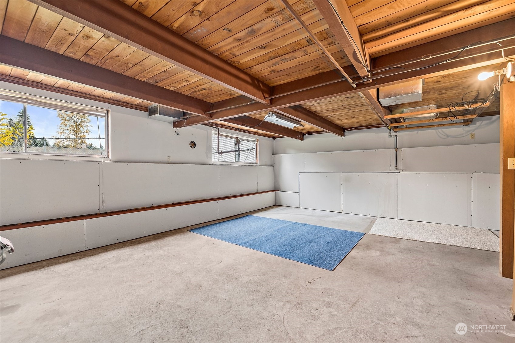 14530 Southeast 112th Place Renton, WA 98059 - Photo 19 of 34 a view of a room with wooden floor
