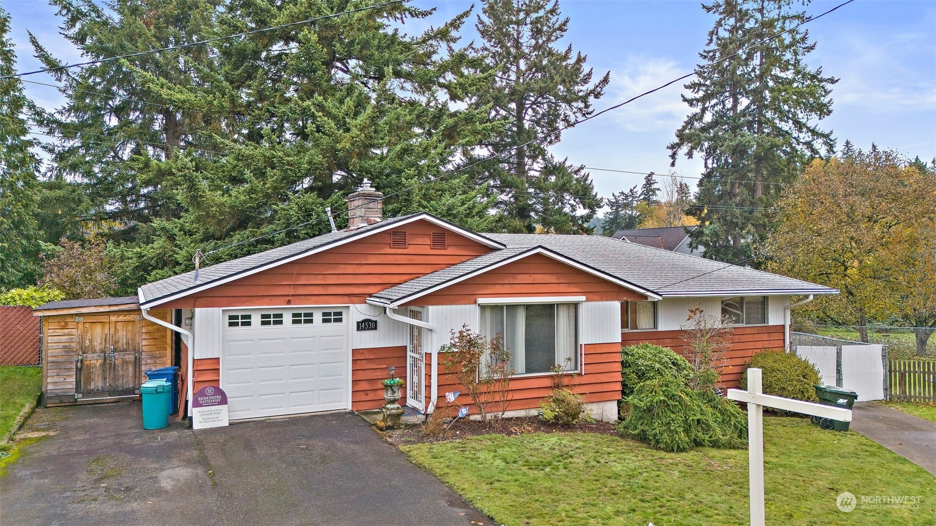 14530 Southeast 112th Place Renton, WA 98059 - Photo 23 of 34 a front view of a house with a yard