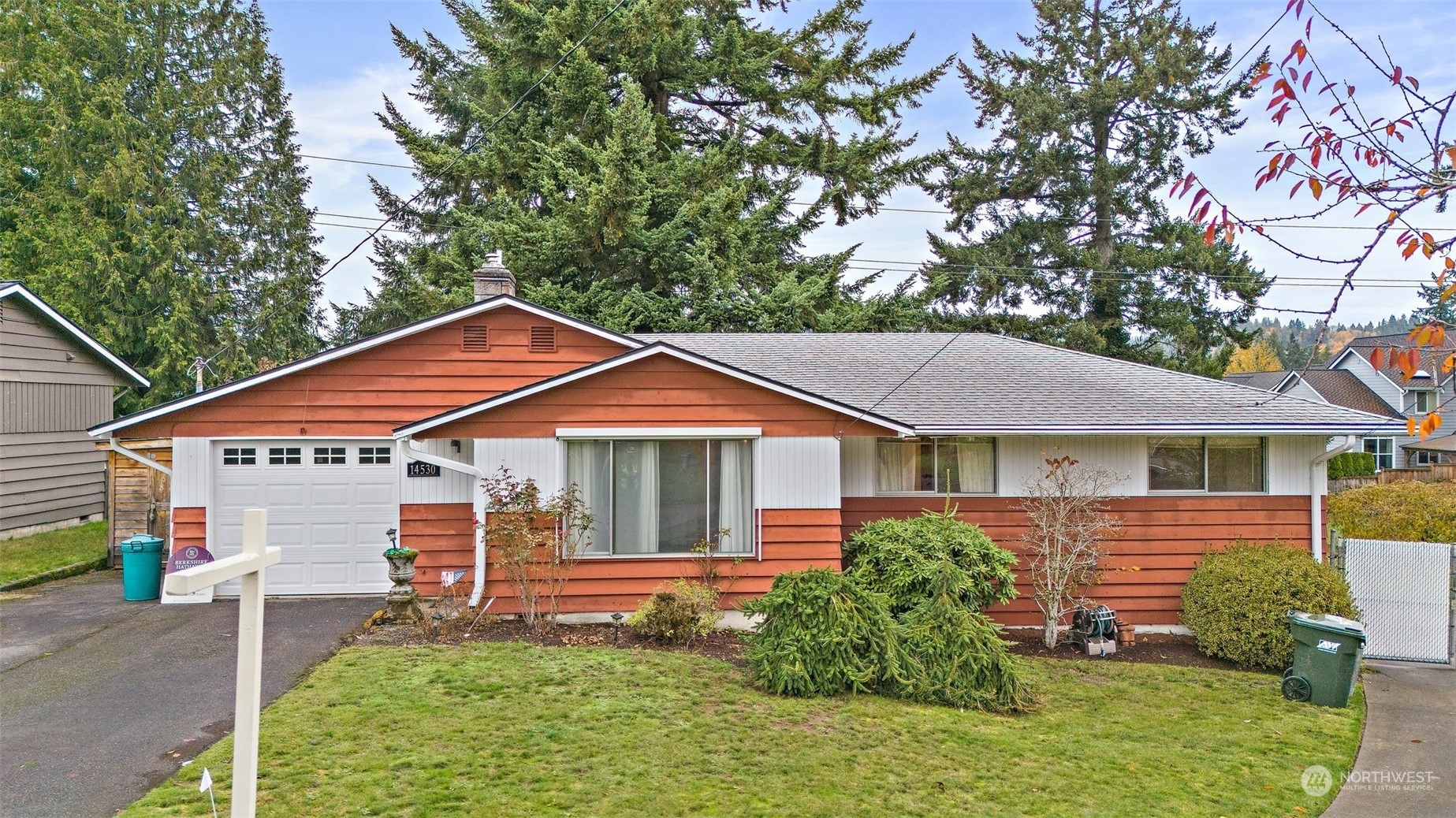 14530 Southeast 112th Place Renton, WA 98059 - Photo 24 of 34 a front view of a house with a yard