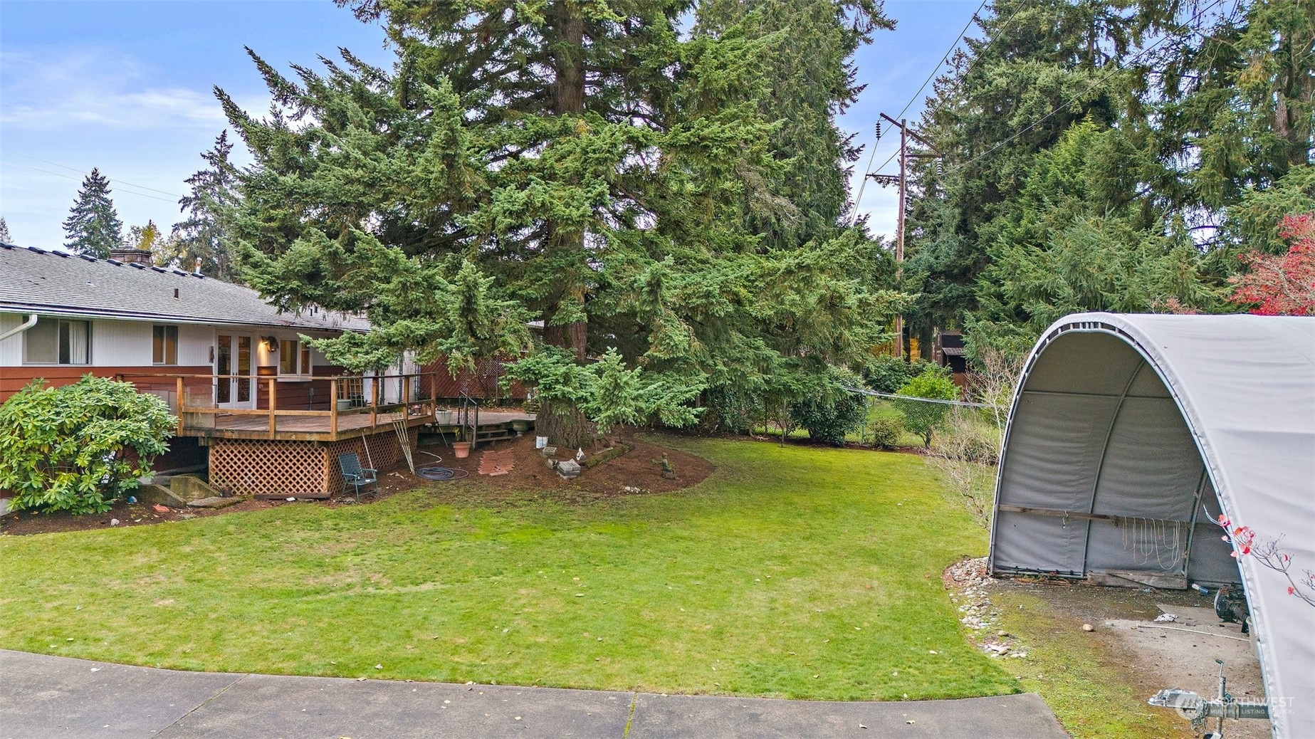 14530 Southeast 112th Place Renton, WA 98059 - Photo 27 of 34 a view of a house with a backyard