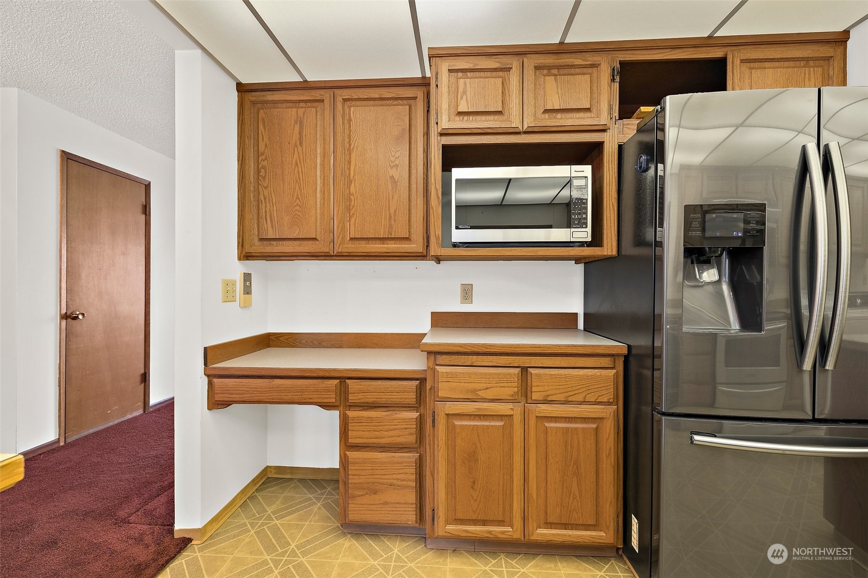 14530 Southeast 112th Place Renton, WA 98059 - Photo 9 of 34 a kitchen with stainless steel appliances granite countertop a refrigerator and a stove
