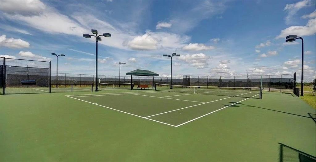 14308 Easy Goer Street Ruskin, FL 33573 - Photo 13 of 14 a view of a tennis court