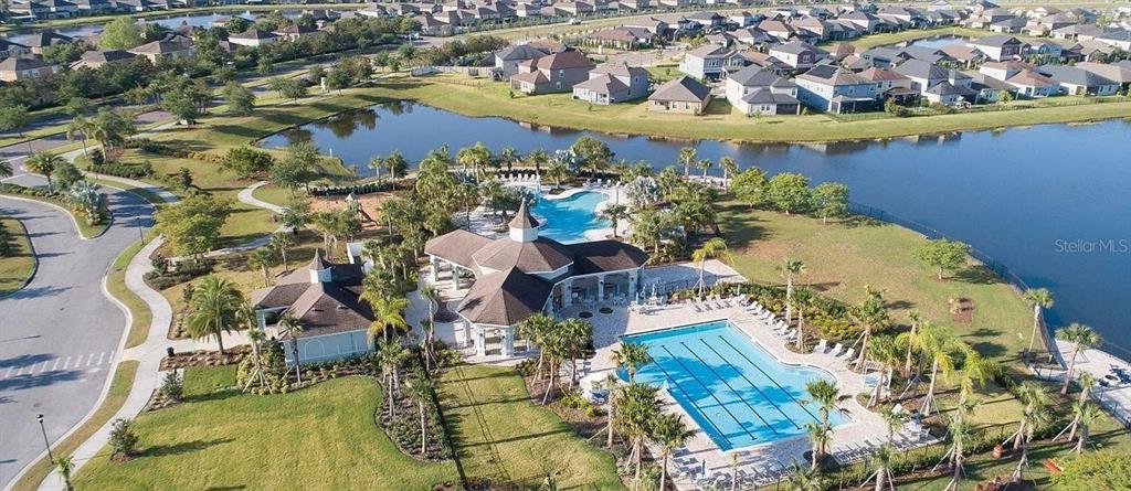 14308 Easy Goer Street Ruskin, FL 33573 - Photo 14 of 14 an aerial view of residential houses with outdoor space
