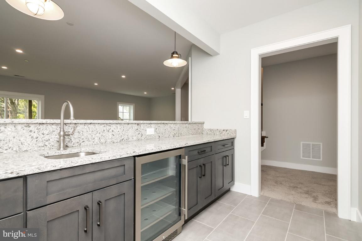 5907 Greentree Road Bethesda, MD 20817 - Photo 40 of 54 Wet bar w/ Fridge to Rec Rm & Theatre/Game Room