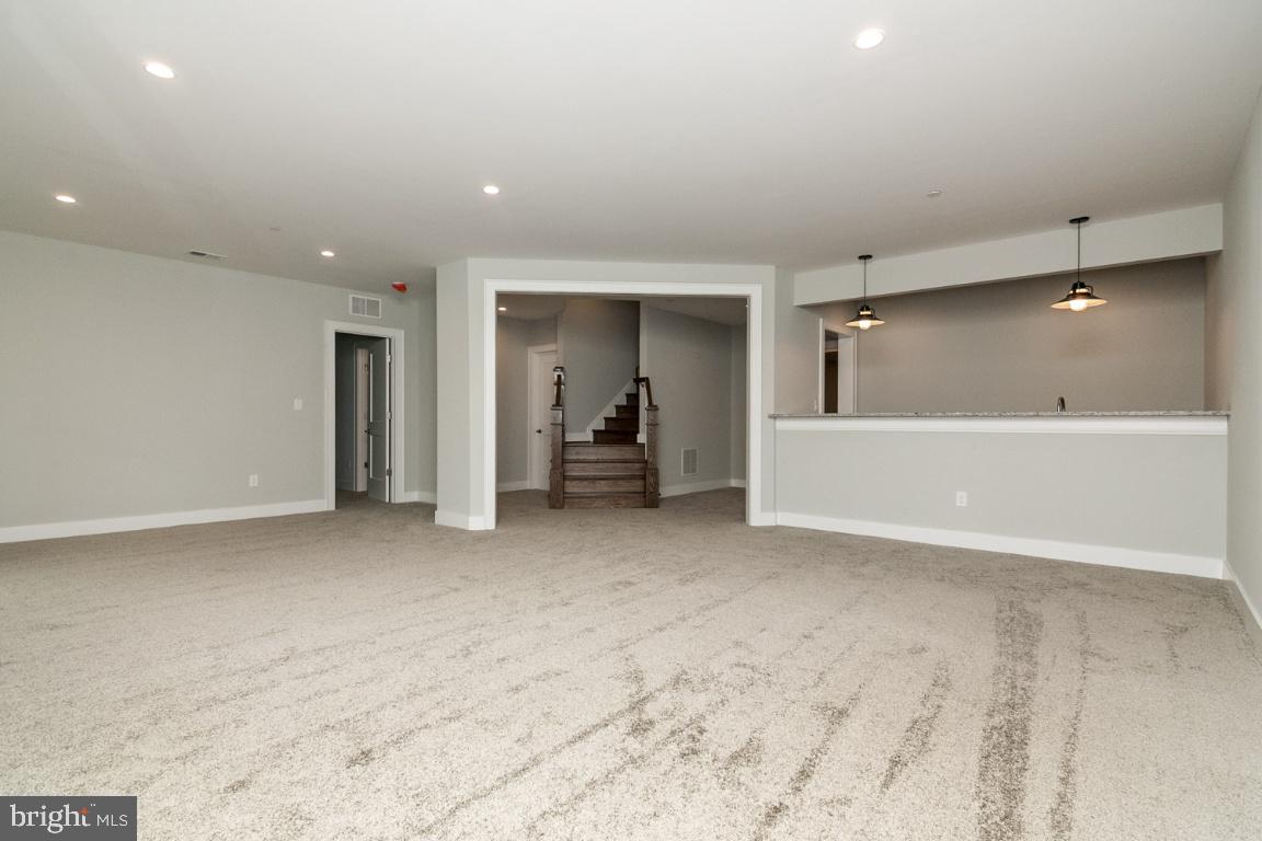 5907 Greentree Road Bethesda, MD 20817 - Photo 42 of 54 Recreation Room to 5th Bedroom and Full Bath