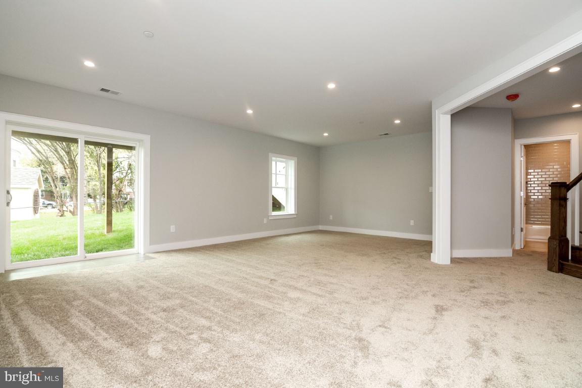 5907 Greentree Road Bethesda, MD 20817 - Photo 45 of 54 Rec Rm w/ walk-out to back yard, view from wet bar