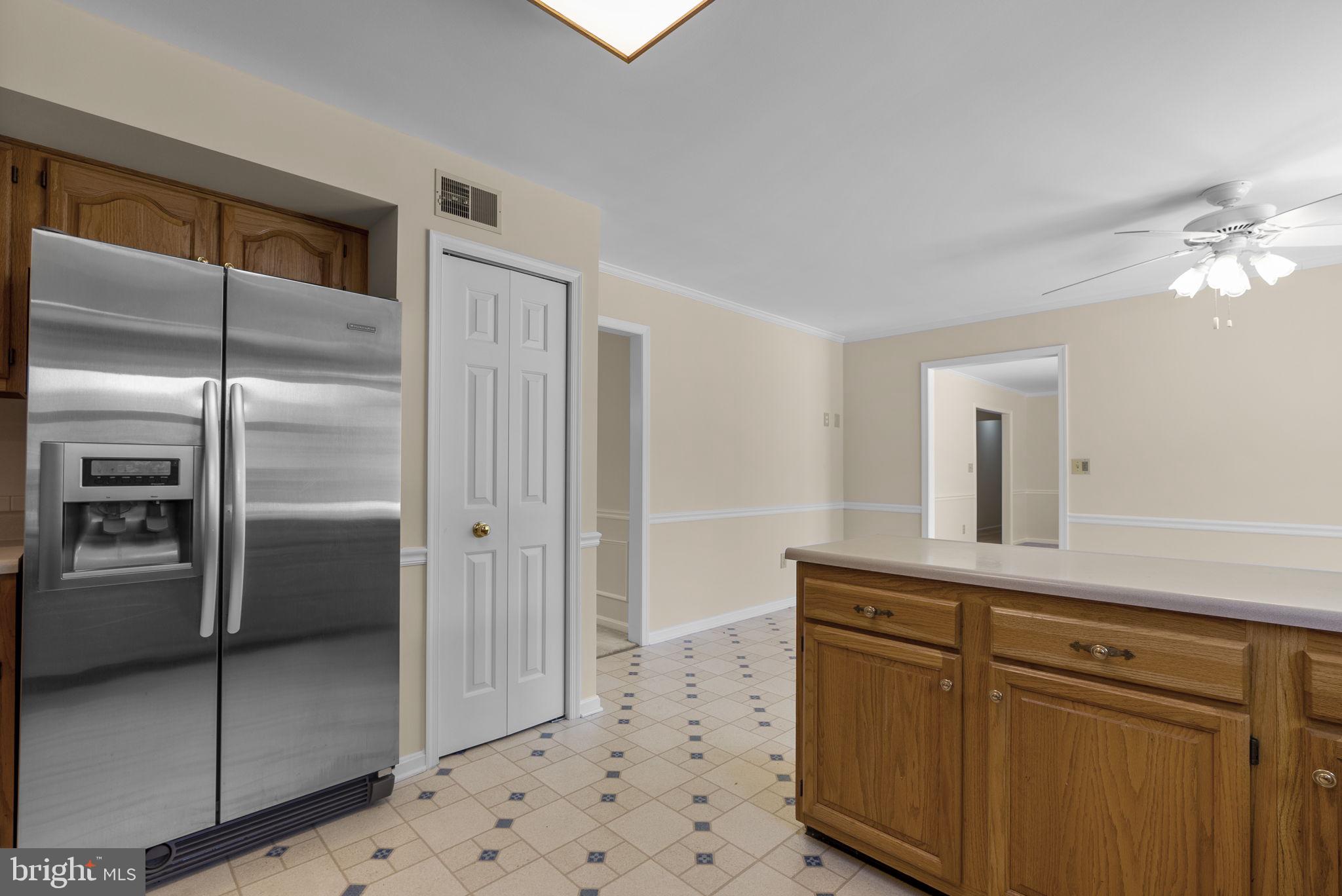 17513 Country View Way Mount Airy, MD 21771 - Photo 17 of 59 a kitchen with stainless steel appliances granite countertop a refrigerator and a sink