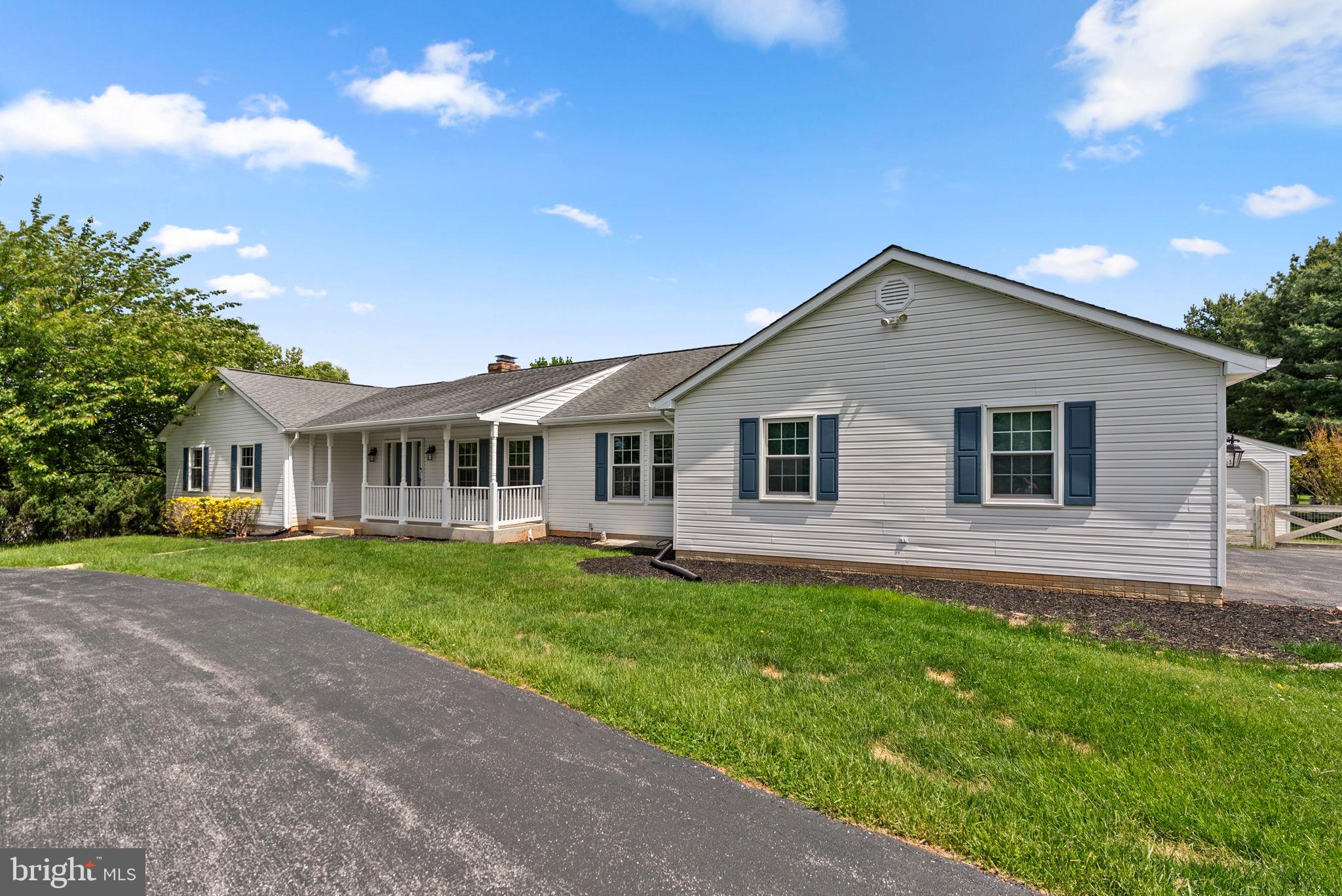 17513 Country View Way Mount Airy, MD 21771 - Photo 3 of 59 a front view of a house with a garden
