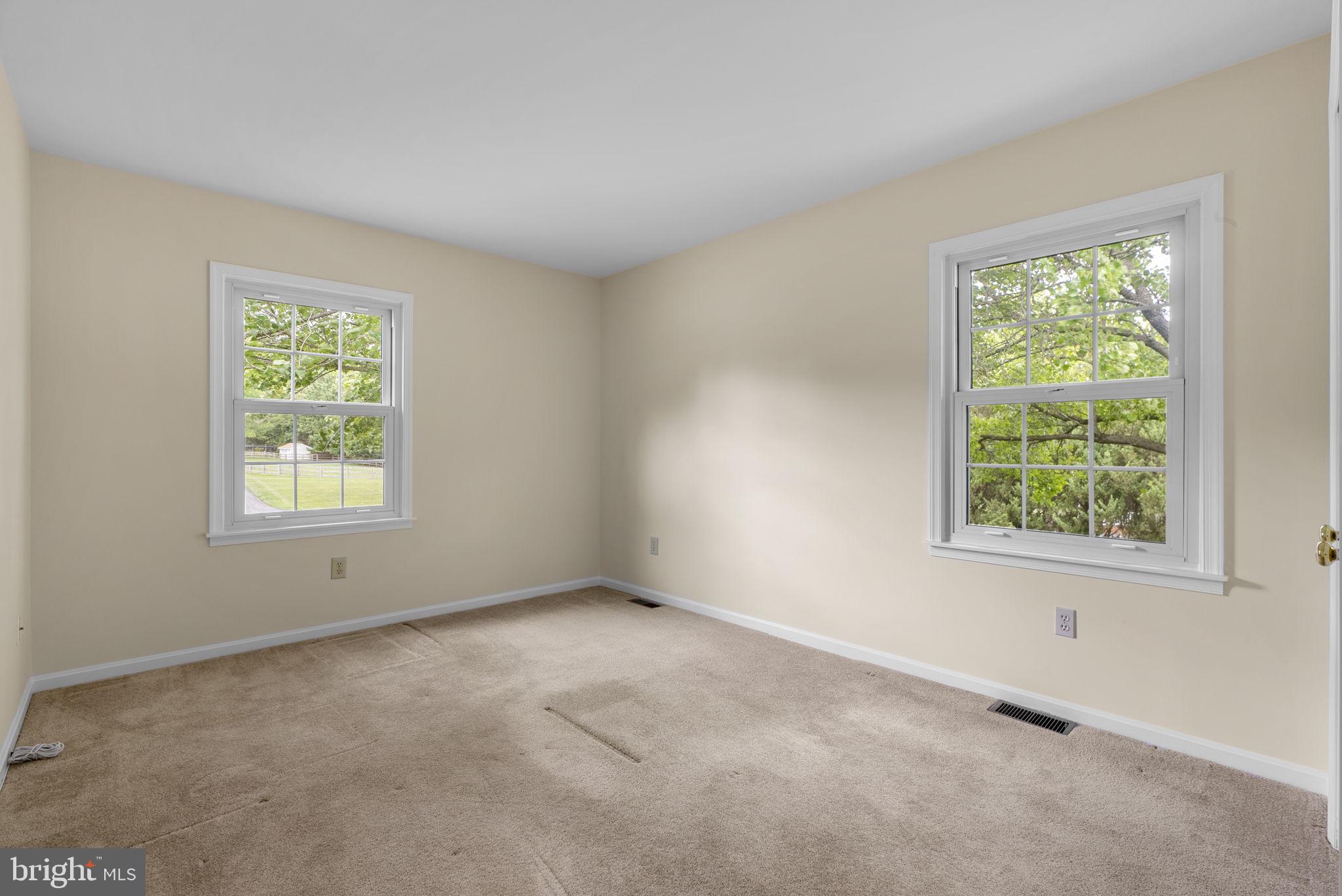 17513 Country View Way Mount Airy, MD 21771 - Photo 34 of 59 a view of an empty room with a window